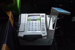 Telephone and a Desk Lamp