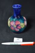 Moorcroft Clematis Pattern Vase on Blue Ground
