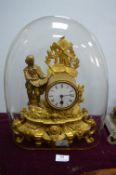 Ornate Gilt Mantel Clock with Glass Dome