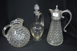 Three Glass Decanters and Jugs