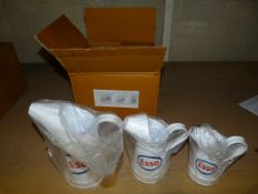 *Two Sets of Three Reproduction Esso Oil Cans