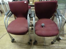 Four Upholstered Chairs on Wheels