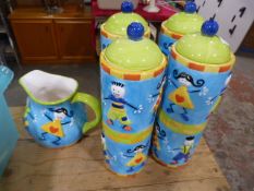 Four Decorative Rayware Storage Jar and a Jug