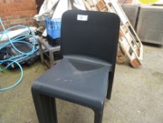 * Chairs x4 black plastic office chairs.