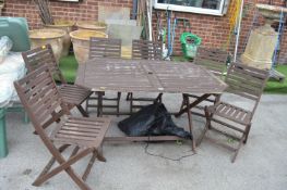 Wooden Garden Table and Six Matching Folding Chair