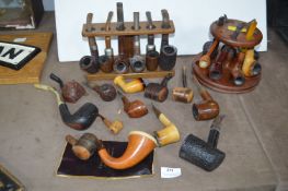 Two Pipe Racks and a Collection of Pipes
