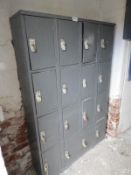 Two Banks of Sixteen Cubicle Lockers
