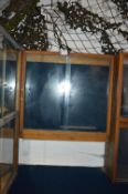 Mahogany Display Cabinet Enclosed by Sliding Doors