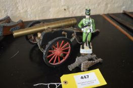 Two Small Model Cannon and a China Figurine of a Rifle Brigade Officer
