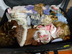 Suitcase and Contents of Pot Face Dolls