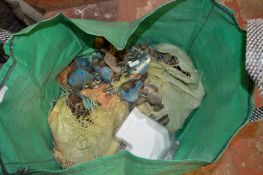 Bag Containing Scaffolding Clamps