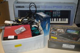 Portable DVD Player, Camera, Portasound Keyboard a