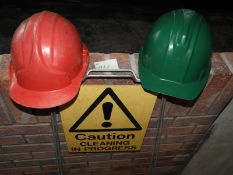 *Caution Cleaning in Progress Sign and Two Hard Hats