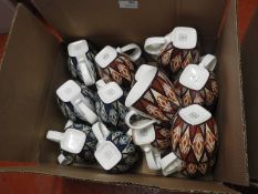 *Twenty Six Decorative Mugs