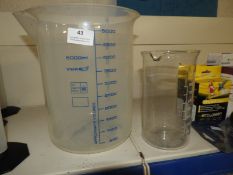 Two Measuring Beakers