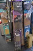Four Packs of Golden Select Grey Laminate Flooring