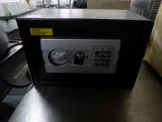 *small black safe with battery powered key pad and key