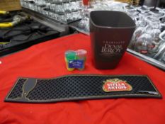 *ice bucket, Stella drip mat and plastic shot glasses