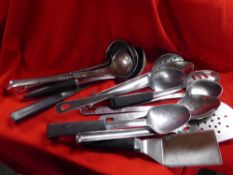 *S/S utensils x 10+ including selection of service spoons, slotted spoons, and fish slices