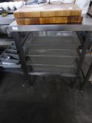 *S/S prep bench with up stand and racking underneath - complete with several plastic gastronomes