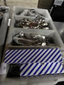 *grey cutlery tray with large quantity of teaspoons - some brand new
