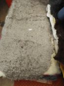 *Rug (as per photograph)