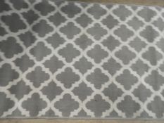 *Rug (as per photograph)