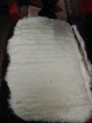 *Rug (as per photograph)