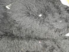 *Rug (as per photograph)