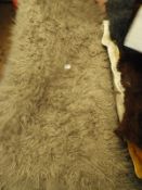 *Rug (as per photograph)