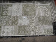 *Rug (as per photograph)