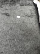 *Rug (as per photograph)