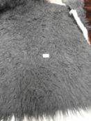 *Rug (as per photograph)