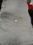 *Rug (as per photograph)