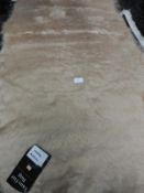 *Rug (as per photograph)