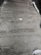 *Rug (as per photograph)