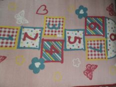 *Rug (as per photograph)