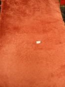 *Rug (as per photograph)