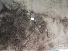 *Rug (as per photograph)