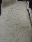 *Rug (as per photograph)