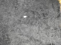 *Rug (as per photograph)