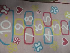 *Rug (as per photograph)