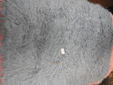 *Rug (as per photograph)