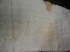 *Rug (as per photograph)