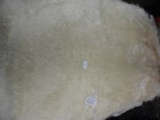 *Rug (as per photograph)