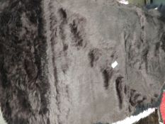 *Rug (as per photograph)