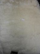 *Rug (as per photograph)