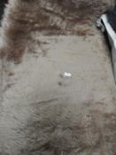 *Rug (as per photograph)