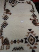 *Rug (as per photograph)