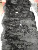 *Rug (as per photograph)